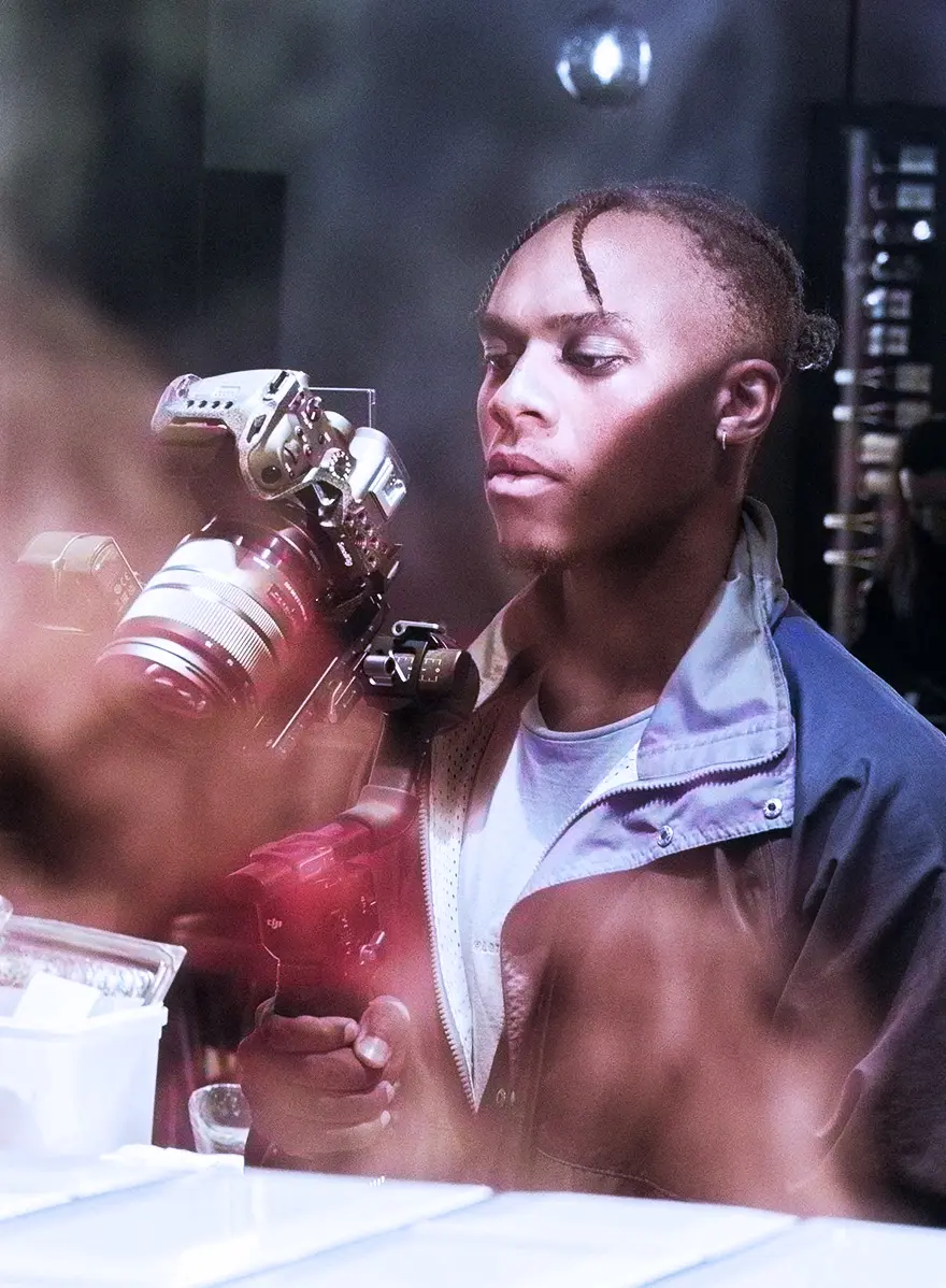 A Media24 employee filming